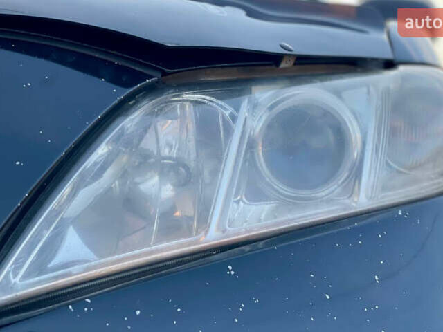 Черный Тойота Камри, объемом двигателя 2.4 л и пробегом 450 тыс. км за 7200 $, фото 5 на Automoto.ua