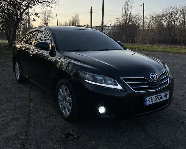 Черный Тойота Камри, объемом двигателя 2.4 л и пробегом 366 тыс. км за 6500 $, фото 6 на Automoto.ua