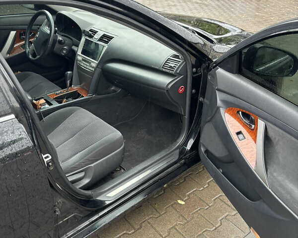 Тойота Камри 2009 в Киеве на Automoto.ua Черный Тойота Камри, объемом двигателя 2.36 л и пробегом 299 тыс. км за 9200 $, фото 12 на Automoto.ua