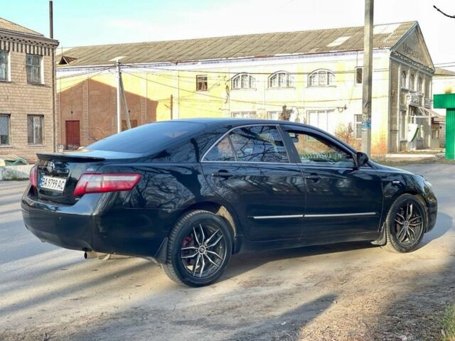 Черный Тойота Камри, объемом двигателя 2.4 л и пробегом 400 тыс. км за 7100 $, фото 2 на Automoto.ua