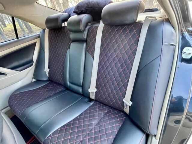 Черный Тойота Камри, объемом двигателя 2.4 л и пробегом 400 тыс. км за 7100 $, фото 6 на Automoto.ua