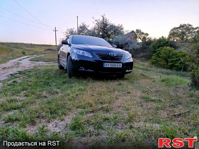 Черный Тойота Камри, объемом двигателя 2.4 л и пробегом 202 тыс. км за 9500 $, фото 6 на Automoto.ua