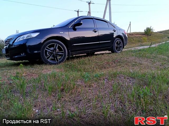 Черный Тойота Камри, объемом двигателя 2.4 л и пробегом 202 тыс. км за 9500 $, фото 4 на Automoto.ua