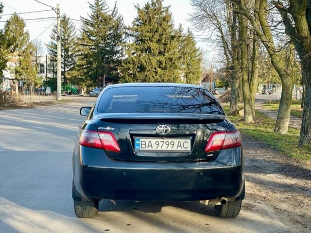 Черный Тойота Камри, объемом двигателя 2.4 л и пробегом 400 тыс. км за 7100 $, фото 1 на Automoto.ua