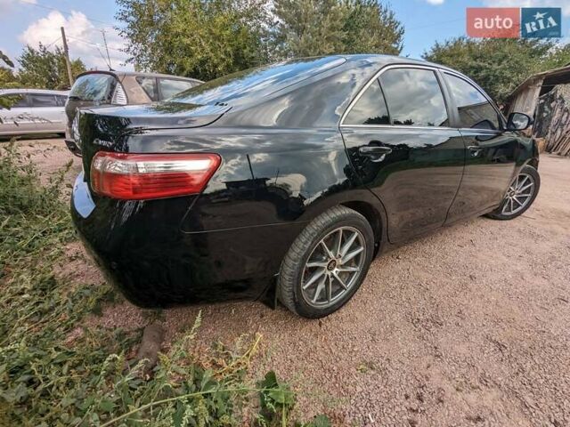 Черный Тойота Камри, объемом двигателя 2.4 л и пробегом 192 тыс. км за 8500 $, фото 6 на Automoto.ua