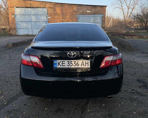 Черный Тойота Камри, объемом двигателя 2.4 л и пробегом 366 тыс. км за 6500 $, фото 3 на Automoto.ua