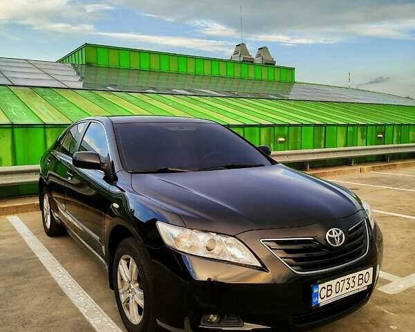 Черный Тойота Камри, объемом двигателя 2.36 л и пробегом 240 тыс. км за 11000 $, фото 1 на Automoto.ua