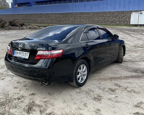 Черный Тойота Камри, объемом двигателя 2.4 л и пробегом 320 тыс. км за 9999 $, фото 6 на Automoto.ua