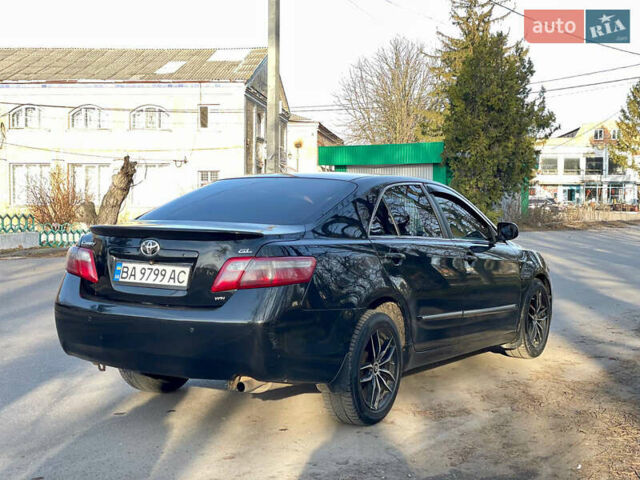 Черный Тойота Камри, объемом двигателя 2.4 л и пробегом 450 тыс. км за 7200 $, фото 2 на Automoto.ua