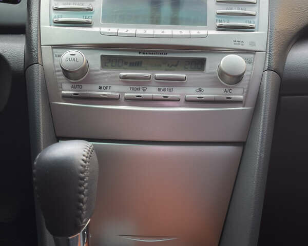 Черный Тойота Камри, объемом двигателя 2.4 л и пробегом 320 тыс. км за 9999 $, фото 10 на Automoto.ua