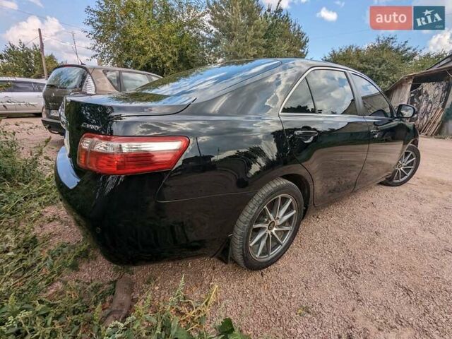 Черный Тойота Камри, объемом двигателя 2.4 л и пробегом 192 тыс. км за 8500 $, фото 7 на Automoto.ua