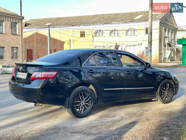 Черный Тойота Камри, объемом двигателя 2.4 л и пробегом 450 тыс. км за 7200 $, фото 4 на Automoto.ua