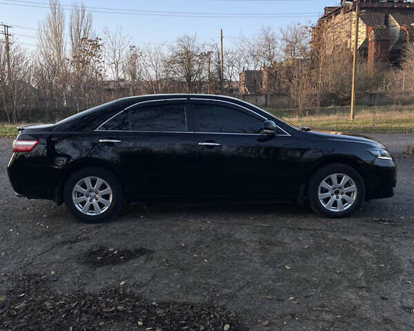 Черный Тойота Камри, объемом двигателя 2.4 л и пробегом 366 тыс. км за 6500 $, фото 5 на Automoto.ua