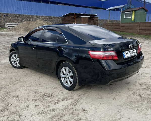 Черный Тойота Камри, объемом двигателя 2.4 л и пробегом 320 тыс. км за 9999 $, фото 3 на Automoto.ua