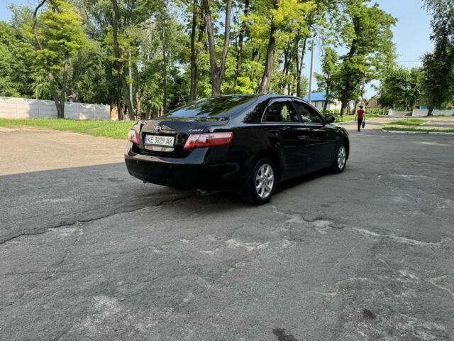 Чорний Тойота Камрі, об'ємом двигуна 2.4 л та пробігом 175 тис. км за 11200 $, фото 7 на Automoto.ua
