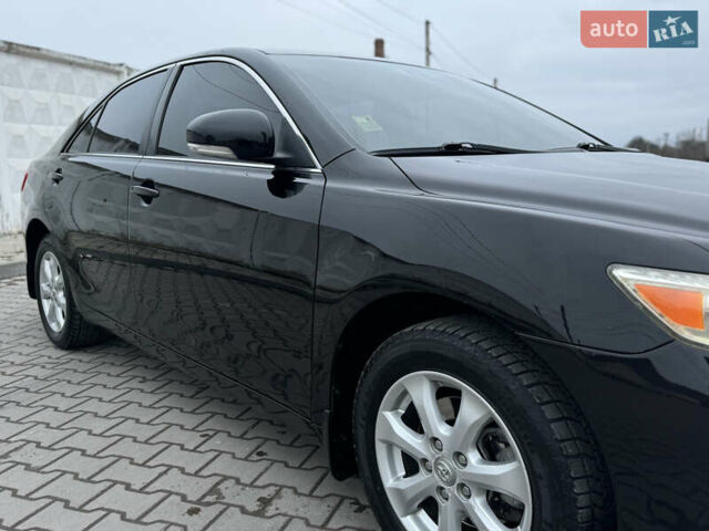 Черный Тойота Камри, объемом двигателя 2.4 л и пробегом 206 тыс. км за 10750 $, фото 34 на Automoto.ua