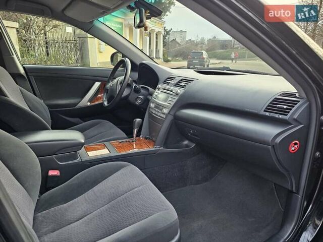 Черный Тойота Камри, объемом двигателя 2.36 л и пробегом 197 тыс. км за 11000 $, фото 25 на Automoto.ua