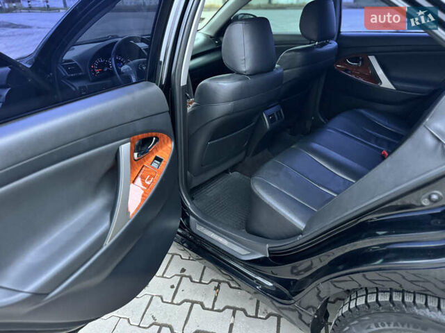 Черный Тойота Камри, объемом двигателя 2.4 л и пробегом 206 тыс. км за 10750 $, фото 56 на Automoto.ua