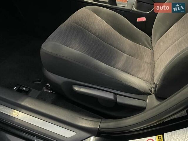 Черный Тойота Камри, объемом двигателя 2.4 л и пробегом 78 тыс. км за 11800 $, фото 1 на Automoto.ua