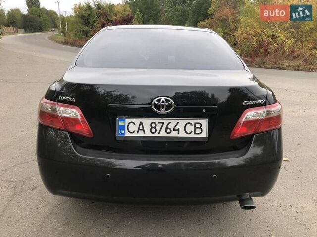 Черный Тойота Камри, объемом двигателя 2.36 л и пробегом 255 тыс. км за 8500 $, фото 10 на Automoto.ua