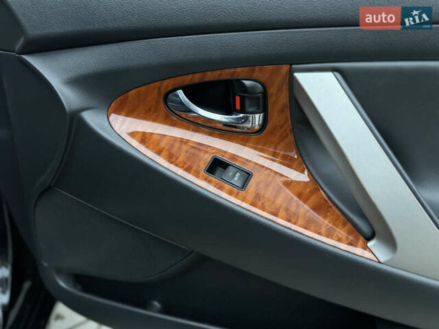 Черный Тойота Камри, объемом двигателя 2.4 л и пробегом 206 тыс. км за 10750 $, фото 71 на Automoto.ua