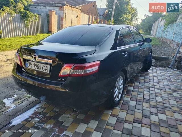 Черный Тойота Камри, объемом двигателя 2.49 л и пробегом 224 тыс. км за 8700 $, фото 1 на Automoto.ua