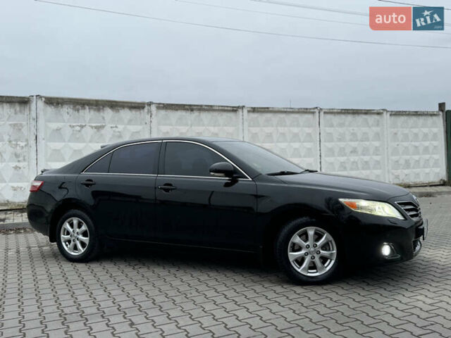 Черный Тойота Камри, объемом двигателя 2.4 л и пробегом 206 тыс. км за 10750 $, фото 6 на Automoto.ua