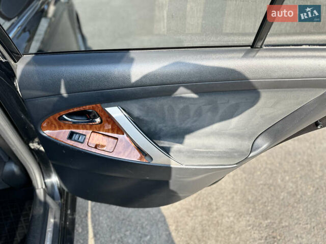 Черный Тойота Камри, объемом двигателя 2.36 л и пробегом 270 тыс. км за 8900 $, фото 19 на Automoto.ua