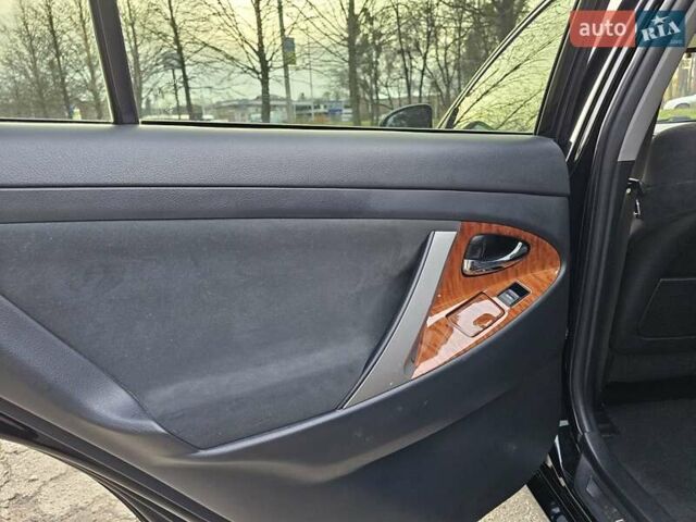 Черный Тойота Камри, объемом двигателя 2.36 л и пробегом 197 тыс. км за 11000 $, фото 17 на Automoto.ua