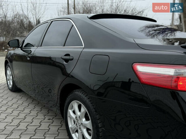 Черный Тойота Камри, объемом двигателя 2.4 л и пробегом 206 тыс. км за 10750 $, фото 21 на Automoto.ua