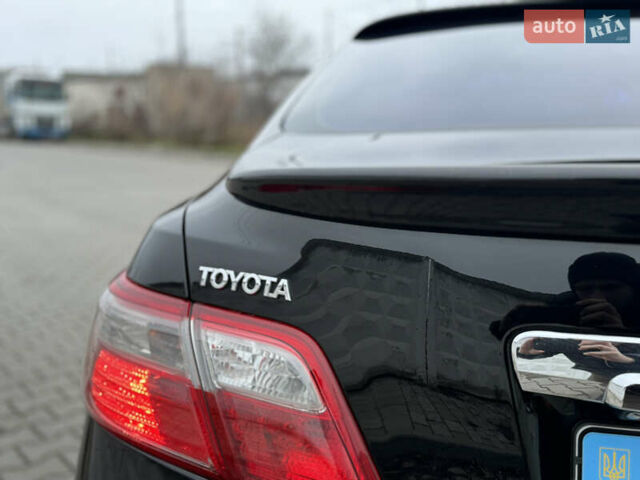 Черный Тойота Камри, объемом двигателя 2.4 л и пробегом 206 тыс. км за 10750 $, фото 14 на Automoto.ua