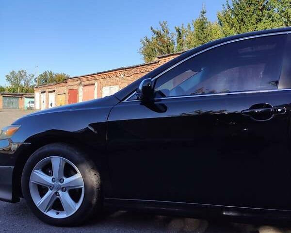 Чорний Тойота Камрі, об'ємом двигуна 2.5 л та пробігом 259 тис. км за 8900 $, фото 1 на Automoto.ua