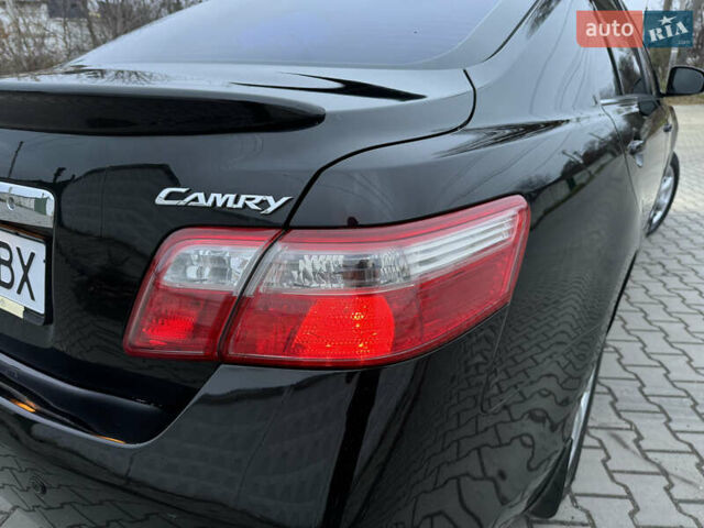 Черный Тойота Камри, объемом двигателя 2.4 л и пробегом 206 тыс. км за 10750 $, фото 36 на Automoto.ua