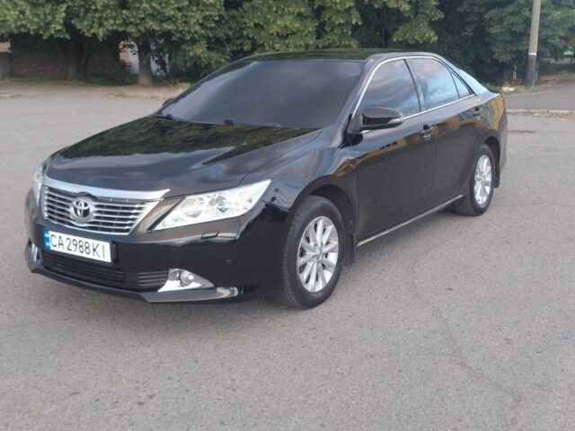 Черный Тойота Камри, объемом двигателя 2.5 л и пробегом 263 тыс. км за 13200 $, фото 2 на Automoto.ua