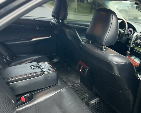 Черный Тойота Камри, объемом двигателя 3.46 л и пробегом 217 тыс. км за 13500 $, фото 19 на Automoto.ua