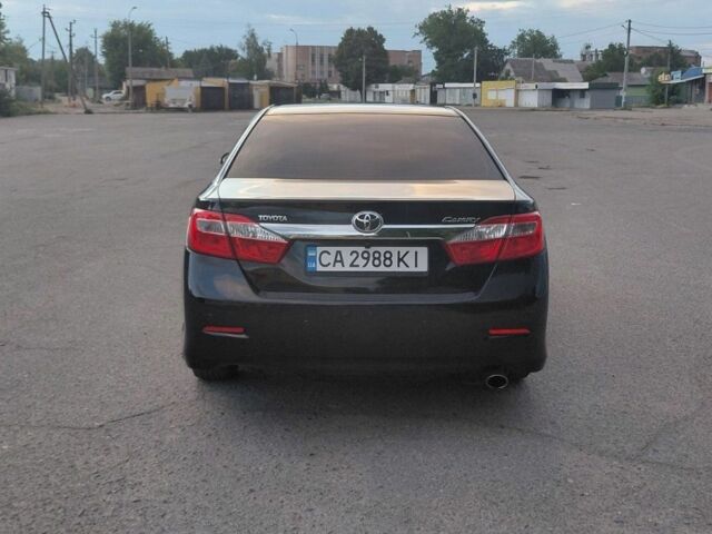 Черный Тойота Камри, объемом двигателя 2.5 л и пробегом 263 тыс. км за 13200 $, фото 3 на Automoto.ua
