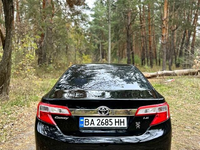 Черный Тойота Камри, объемом двигателя 2.5 л и пробегом 210 тыс. км за 10000 $, фото 2 на Automoto.ua