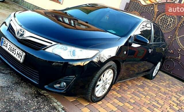 Черный Тойота Камри, объемом двигателя 2.5 л и пробегом 154 тыс. км за 9490 $, фото 11 на Automoto.ua