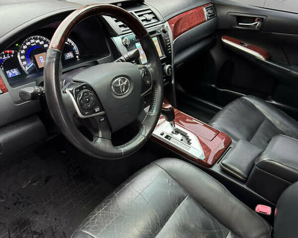 Черный Тойота Камри, объемом двигателя 2.5 л и пробегом 280 тыс. км за 10999 $, фото 9 на Automoto.ua