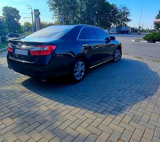 Чорний Тойота Камрі, об'ємом двигуна 2.5 л та пробігом 180 тис. км за 13100 $, фото 2 на Automoto.ua