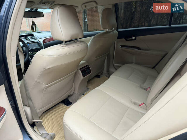 Чорний Тойота Камрі, об'ємом двигуна 2.49 л та пробігом 290 тис. км за 9700 $, фото 11 на Automoto.ua