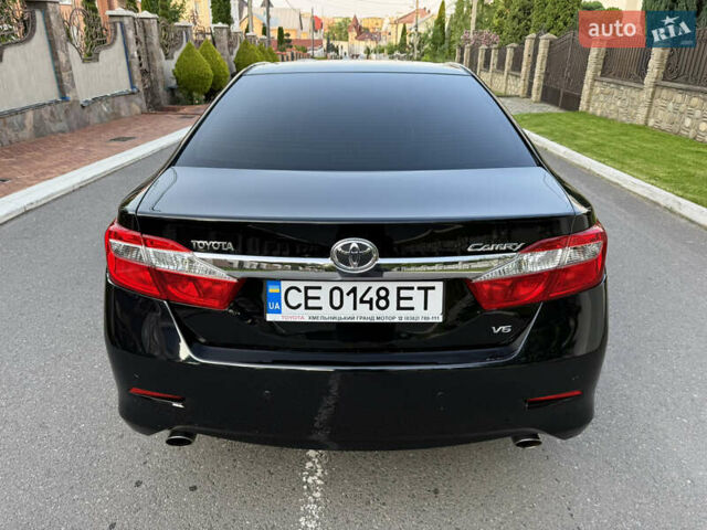 Чорний Тойота Камрі, об'ємом двигуна 3.46 л та пробігом 210 тис. км за 13500 $, фото 3 на Automoto.ua