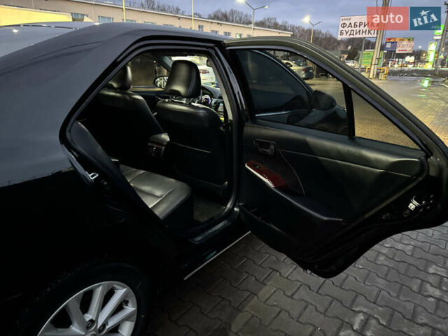 Черный Тойота Камри, объемом двигателя 2.5 л и пробегом 190 тыс. км за 13000 $, фото 12 на Automoto.ua