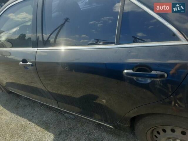 Черный Тойота Камри, объемом двигателя 2.5 л и пробегом 646 тыс. км за 8994 $, фото 26 на Automoto.ua