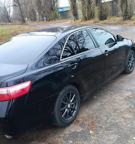 Черный Тойота Камри, объемом двигателя 2.36 л и пробегом 248 тыс. км за 10500 $, фото 6 на Automoto.ua