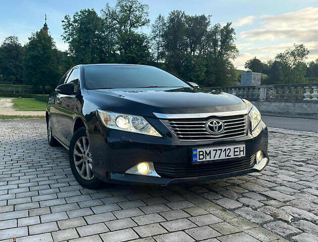 Чорний Тойота Камрі, об'ємом двигуна 2.49 л та пробігом 257 тис. км за 14000 $, фото 4 на Automoto.ua