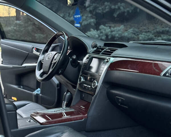 Чорний Тойота Камрі, об'ємом двигуна 2.49 л та пробігом 215 тис. км за 14500 $, фото 14 на Automoto.ua