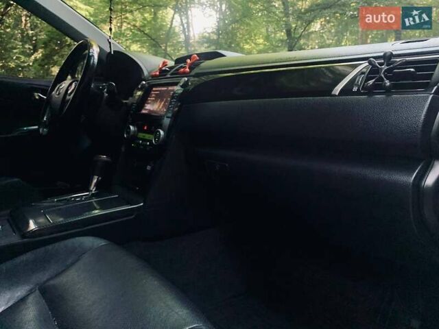 Черный Тойота Камри, объемом двигателя 2.5 л и пробегом 250 тыс. км за 13000 $, фото 15 на Automoto.ua