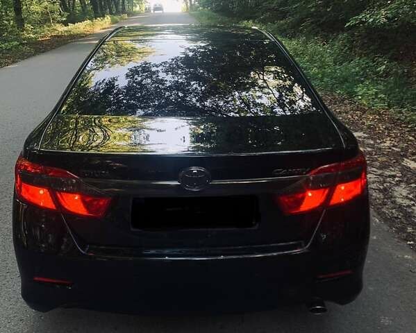 Черный Тойота Камри, объемом двигателя 2.5 л и пробегом 250 тыс. км за 13000 $, фото 10 на Automoto.ua