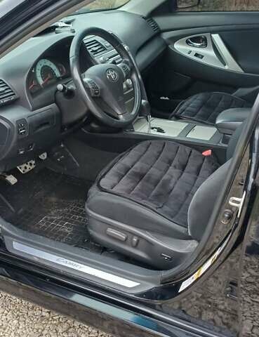 Черный Тойота Камри, объемом двигателя 2.5 л и пробегом 260 тыс. км за 10200 $, фото 2 на Automoto.ua